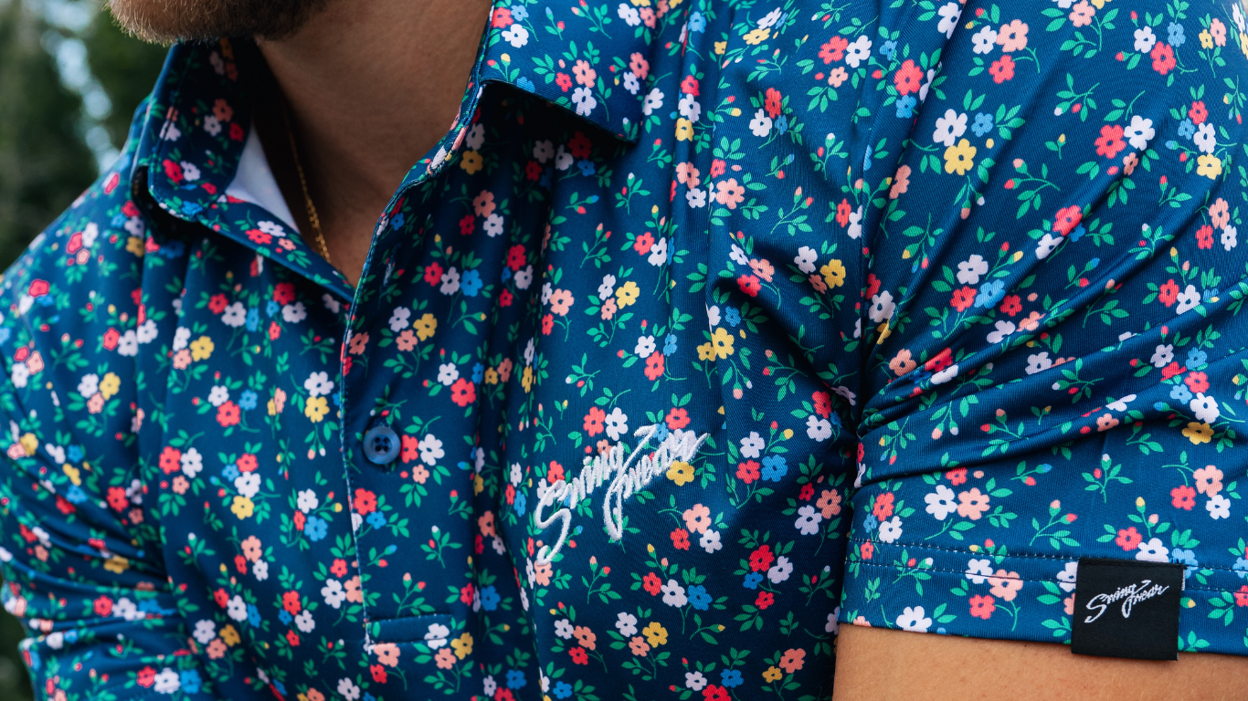 close up of spring floral golf polo