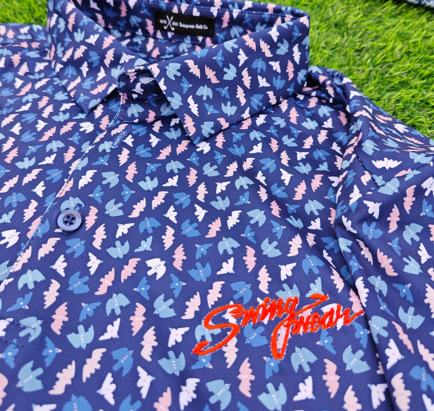 bird golf polo close up