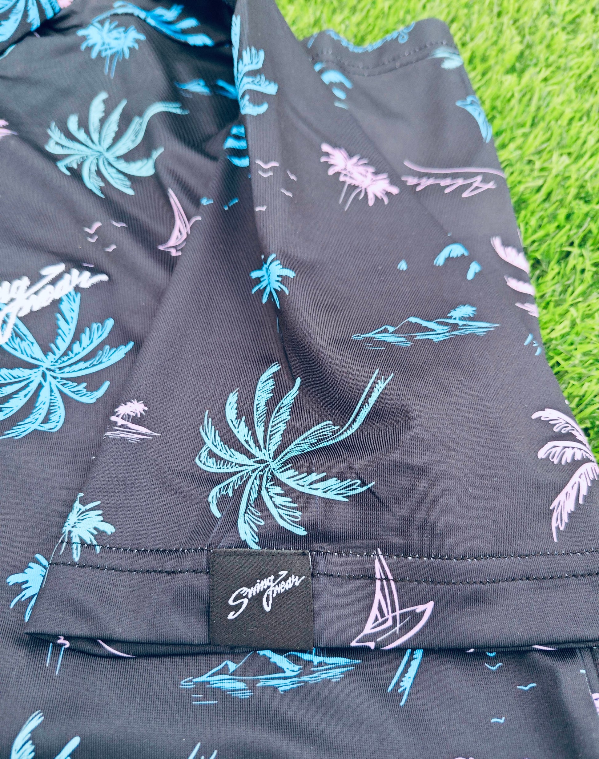 palm tree golf polo sleeve close up