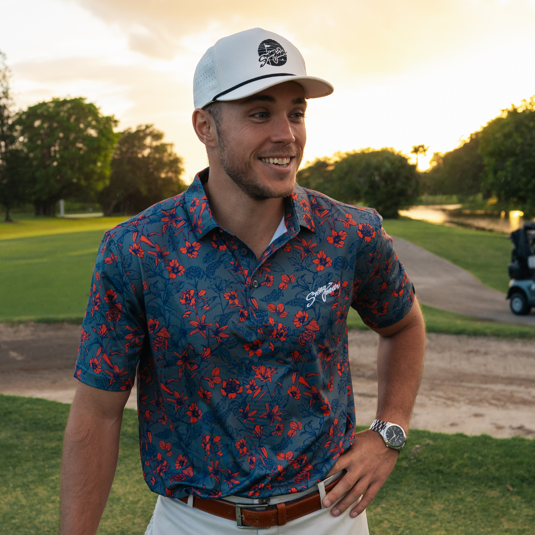 blooming floral golf polo at sunset