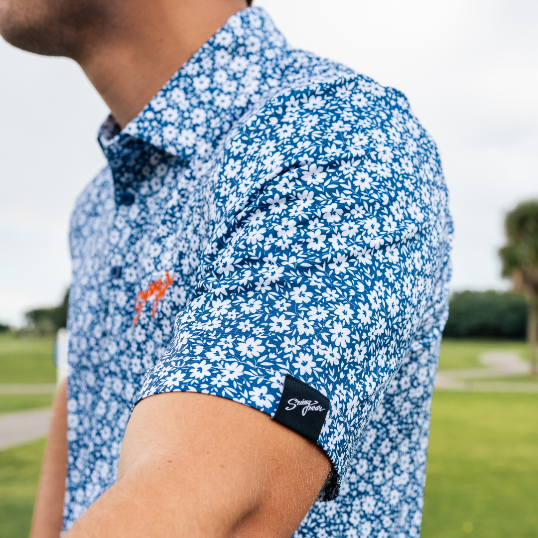 blue and white floral golf polo